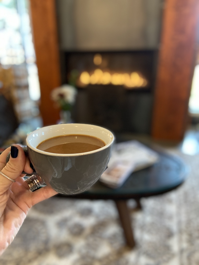 Cup of coffee, relaxing by the fire